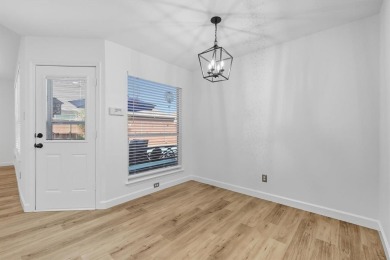 Beautifully updated and move-in ready, this 4-bedroom, 3.5-bath on Stewart Peninsula Golf Course in Texas - for sale on GolfHomes.com, golf home, golf lot