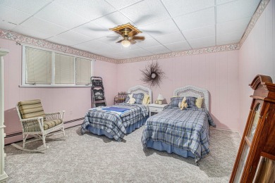 Welcome to this charming ranch-style home overlooking the 4th on Canadian Lakes Country Club-The Highlands Course in Michigan - for sale on GolfHomes.com, golf home, golf lot