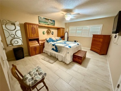 This GROUND FLOOR condo is a true gem with 1,400 sq ft of living on On Top Of The World Golf Course in Florida - for sale on GolfHomes.com, golf home, golf lot
