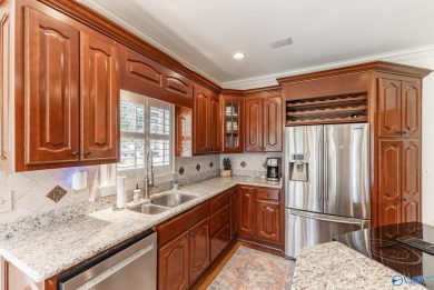 Stunning 4BR, 3.5BA home in desirable Hampton Cove on the 9th on Hampton Cove Golf Course in Alabama - for sale on GolfHomes.com, golf home, golf lot