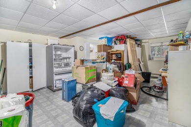 Welcome to this charming ranch-style home overlooking the 4th on Canadian Lakes Country Club-The Highlands Course in Michigan - for sale on GolfHomes.com, golf home, golf lot