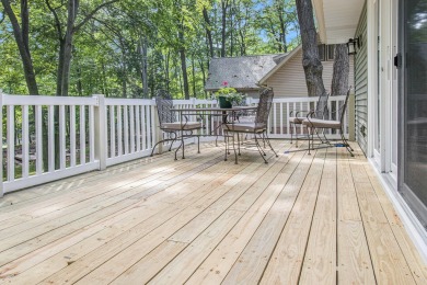 Welcome to this charming ranch-style home overlooking the 4th on Canadian Lakes Country Club-The Highlands Course in Michigan - for sale on GolfHomes.com, golf home, golf lot