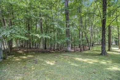 Welcome to this charming ranch-style home overlooking the 4th on Canadian Lakes Country Club-The Highlands Course in Michigan - for sale on GolfHomes.com, golf home, golf lot