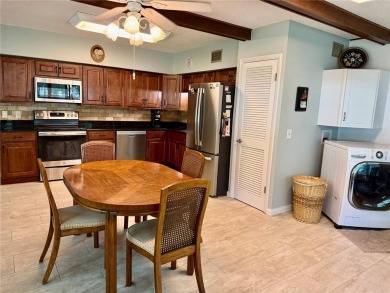 This GROUND FLOOR condo is a true gem with 1,400 sq ft of living on On Top Of The World Golf Course in Florida - for sale on GolfHomes.com, golf home, golf lot
