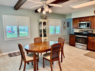 This GROUND FLOOR condo is a true gem with 1,400 sq ft of living on On Top Of The World Golf Course in Florida - for sale on GolfHomes.com, golf home, golf lot