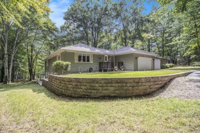 Welcome to this charming ranch-style home overlooking the 4th on Canadian Lakes Country Club-The Highlands Course in Michigan - for sale on GolfHomes.com, golf home, golf lot