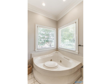 Stunning 4BR, 3.5BA home in desirable Hampton Cove on the 9th on Hampton Cove Golf Course in Alabama - for sale on GolfHomes.com, golf home, golf lot