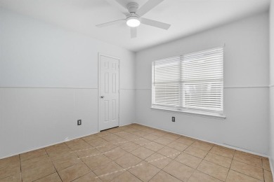 Beautifully updated and move-in ready, this 4-bedroom, 3.5-bath on Stewart Peninsula Golf Course in Texas - for sale on GolfHomes.com, golf home, golf lot