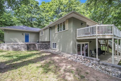 Welcome to this charming ranch-style home overlooking the 4th on Canadian Lakes Country Club-The Highlands Course in Michigan - for sale on GolfHomes.com, golf home, golf lot