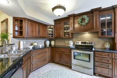 Elegant condominium with GARAGE in well established gated on Pointe Royale Village Country Club in Missouri - for sale on GolfHomes.com, golf home, golf lot