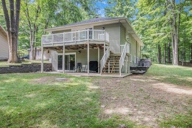 Welcome to this charming ranch-style home overlooking the 4th on Canadian Lakes Country Club-The Highlands Course in Michigan - for sale on GolfHomes.com, golf home, golf lot