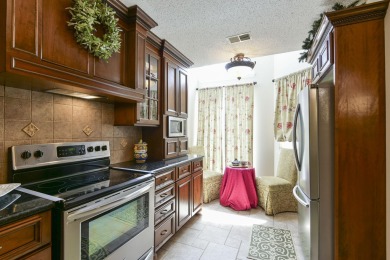 Elegant condominium with GARAGE in well established gated on Pointe Royale Village Country Club in Missouri - for sale on GolfHomes.com, golf home, golf lot