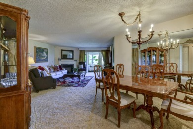 Elegant condominium with GARAGE in well established gated on Pointe Royale Village Country Club in Missouri - for sale on GolfHomes.com, golf home, golf lot