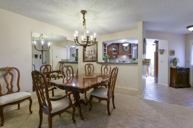 Elegant condominium with GARAGE in well established gated on Pointe Royale Village Country Club in Missouri - for sale on GolfHomes.com, golf home, golf lot