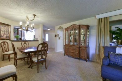 Elegant condominium with GARAGE in well established gated on Pointe Royale Village Country Club in Missouri - for sale on GolfHomes.com, golf home, golf lot