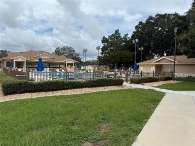 Spacious 2-bedroom, 3-bathroom home located in the active 55+ on Royal Oaks Golf Club in Florida - for sale on GolfHomes.com, golf home, golf lot