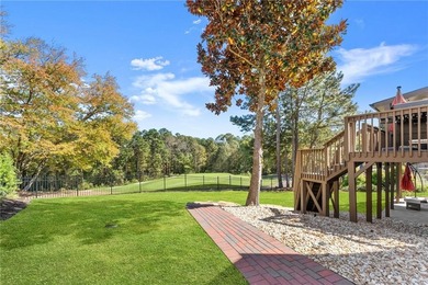 Enjoy Unbeatable views from Morning Coffee to Golden Hour - on Hamilton Mill Golf Club in Georgia - for sale on GolfHomes.com, golf home, golf lot