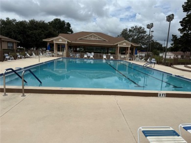Spacious 2-bedroom, 3-bathroom home located in the active 55+ on Royal Oaks Golf Club in Florida - for sale on GolfHomes.com, golf home, golf lot