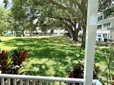 This GROUND FLOOR condo is a true gem with 1,400 sq ft of living on On Top Of The World Golf Course in Florida - for sale on GolfHomes.com, golf home, golf lot
