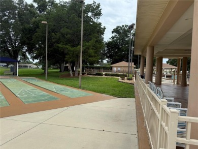 Spacious 2-bedroom, 3-bathroom home located in the active 55+ on Royal Oaks Golf Club in Florida - for sale on GolfHomes.com, golf home, golf lot