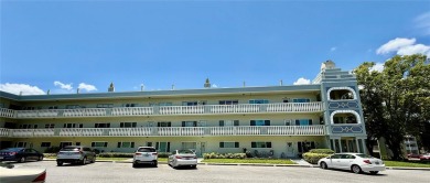 This GROUND FLOOR condo is a true gem with 1,400 sq ft of living on On Top Of The World Golf Course in Florida - for sale on GolfHomes.com, golf home, golf lot