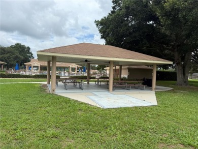 Spacious 2-bedroom, 3-bathroom home located in the active 55+ on Royal Oaks Golf Club in Florida - for sale on GolfHomes.com, golf home, golf lot