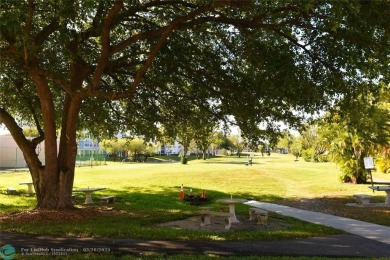 Retirement living at its finest! This stunning, updated 2/2 unit on Sunrise Lakes Phase IV Golf Course in Florida - for sale on GolfHomes.com, golf home, golf lot