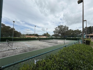 Spacious 2-bedroom, 3-bathroom home located in the active 55+ on Royal Oaks Golf Club in Florida - for sale on GolfHomes.com, golf home, golf lot