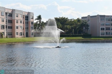 Retirement living at its finest! This stunning, updated 2/2 unit on Sunrise Lakes Phase IV Golf Course in Florida - for sale on GolfHomes.com, golf home, golf lot