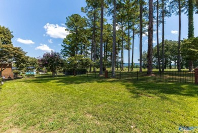 Stunning 4BR, 3.5BA home in desirable Hampton Cove on the 9th on Hampton Cove Golf Course in Alabama - for sale on GolfHomes.com, golf home, golf lot