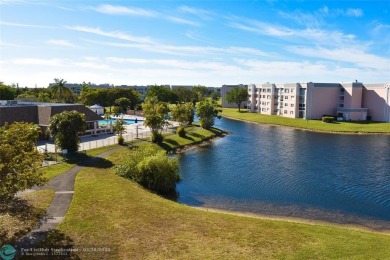 Retirement living at its finest! This stunning, updated 2/2 unit on Sunrise Lakes Phase IV Golf Course in Florida - for sale on GolfHomes.com, golf home, golf lot