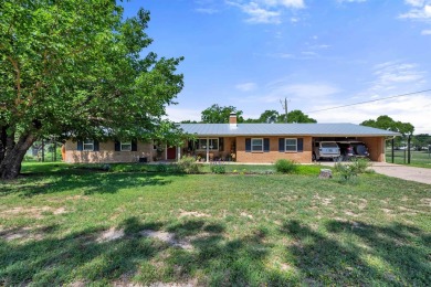 This rare 4-bedroom, single-story home is situated on nearly one on Llano River Golf Course in Texas - for sale on GolfHomes.com, golf home, golf lot