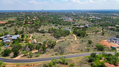 This lot has incredible views of the Texas hill country and is on Blue Lake Golf Club in Texas - for sale on GolfHomes.com, golf home, golf lot