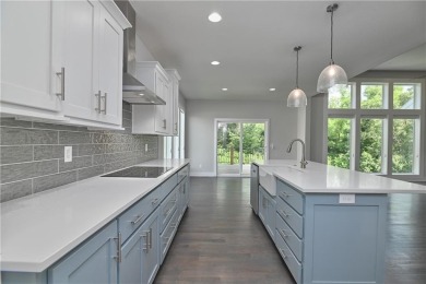 This BEAUTIFUL HOME backs to and walks out to a fully treed on Falcon Lakes Golf Course in Kansas - for sale on GolfHomes.com, golf home, golf lot