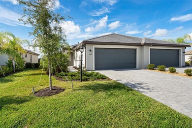 Located in the highly sought-after resort-style community of on Lakewood National Golf Club in Florida - for sale on GolfHomes.com, golf home, golf lot
