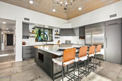 Awaken to sweeping desert vistas where Pinnacle Peak, sparkling on Desert Mountain Golf Club - Renegade Course in Arizona - for sale on GolfHomes.com, golf home, golf lot