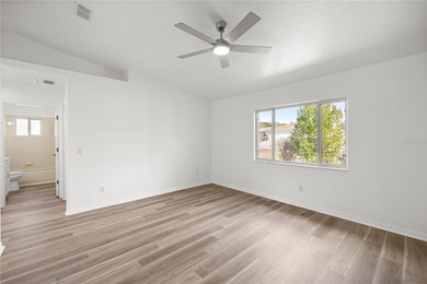 Welcome to this beautifully renovated three-bedroom on Royal Oaks Golf Club in Florida - for sale on GolfHomes.com, golf home, golf lot