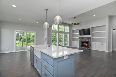 This BEAUTIFUL HOME backs to and walks out to a fully treed on Falcon Lakes Golf Course in Kansas - for sale on GolfHomes.com, golf home, golf lot