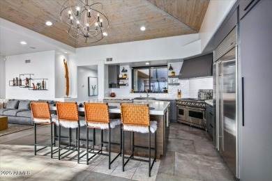 Awaken to sweeping desert vistas where Pinnacle Peak, sparkling on Desert Mountain Golf Club - Renegade Course in Arizona - for sale on GolfHomes.com, golf home, golf lot
