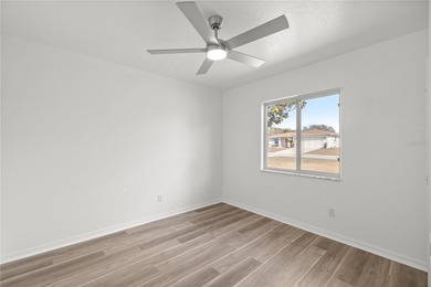 Welcome to this beautifully renovated three-bedroom on Royal Oaks Golf Club in Florida - for sale on GolfHomes.com, golf home, golf lot