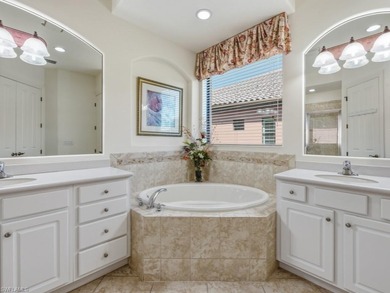 Discover refined WATERFRONT LIVING in the exclusive, gated on The Classics Country Club At Lely Resort in Florida - for sale on GolfHomes.com, golf home, golf lot