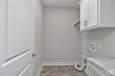 This BEAUTIFUL HOME backs to and walks out to a fully treed on Falcon Lakes Golf Course in Kansas - for sale on GolfHomes.com, golf home, golf lot