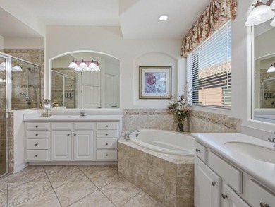 Discover refined WATERFRONT LIVING in the exclusive, gated on The Classics Country Club At Lely Resort in Florida - for sale on GolfHomes.com, golf home, golf lot