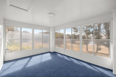 Welcome to this beautifully renovated three-bedroom on Royal Oaks Golf Club in Florida - for sale on GolfHomes.com, golf home, golf lot