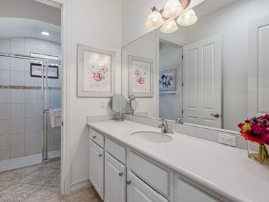 Discover refined WATERFRONT LIVING in the exclusive, gated on The Classics Country Club At Lely Resort in Florida - for sale on GolfHomes.com, golf home, golf lot