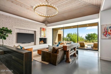 Awaken to sweeping desert vistas where Pinnacle Peak, sparkling on Desert Mountain Golf Club - Renegade Course in Arizona - for sale on GolfHomes.com, golf home, golf lot