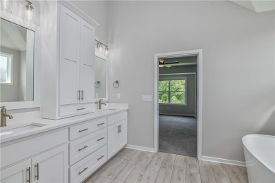 This BEAUTIFUL HOME backs to and walks out to a fully treed on Falcon Lakes Golf Course in Kansas - for sale on GolfHomes.com, golf home, golf lot