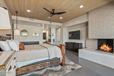 Awaken to sweeping desert vistas where Pinnacle Peak, sparkling on Desert Mountain Golf Club - Renegade Course in Arizona - for sale on GolfHomes.com, golf home, golf lot