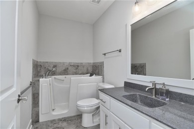 This BEAUTIFUL HOME backs to and walks out to a fully treed on Falcon Lakes Golf Course in Kansas - for sale on GolfHomes.com, golf home, golf lot