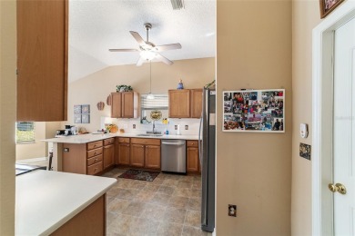 This beautifully maintained Whispering Pines model with NO BOND on Glenview Championship Golf and Country Club in Florida - for sale on GolfHomes.com, golf home, golf lot